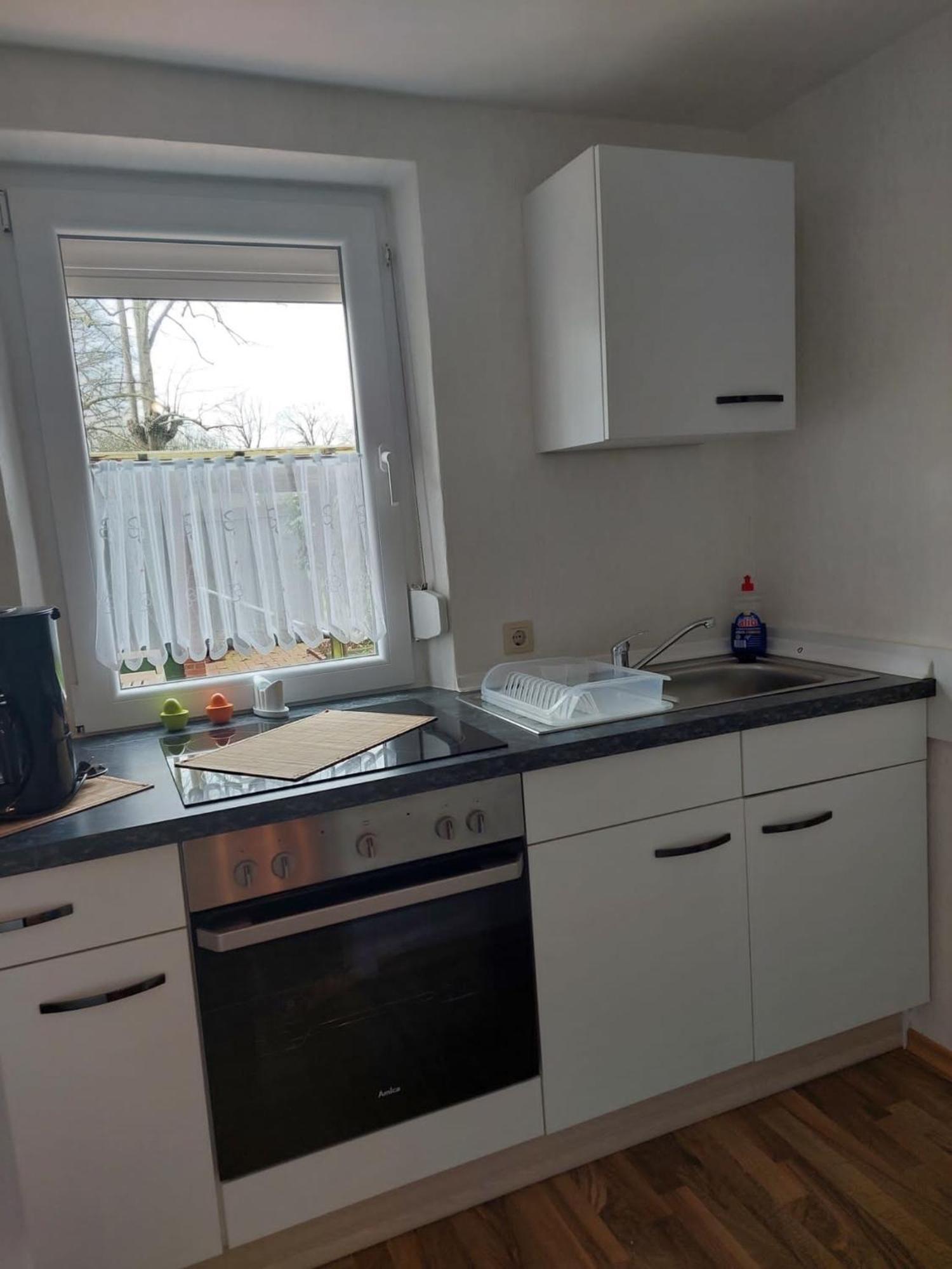 Ferienwohnung Schmidt Krummhörn Buitenkant foto